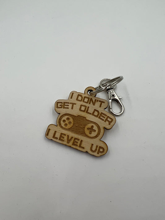 I Don’t Get Older, I Level Up Pine Keychain