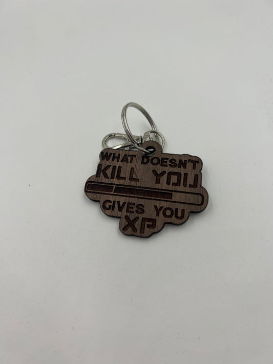 What Doesn’t Kill You Gives You XP Walnut Keychain