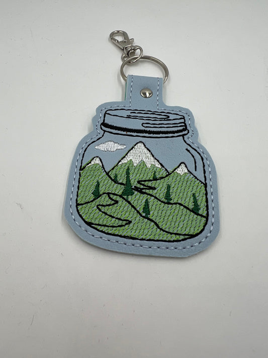 Mountain In A Jar Vinyl Keychain